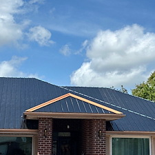 Metal-RE-Roof-in-Pace-FL-Black-Metal-with-Copper-Trim 0